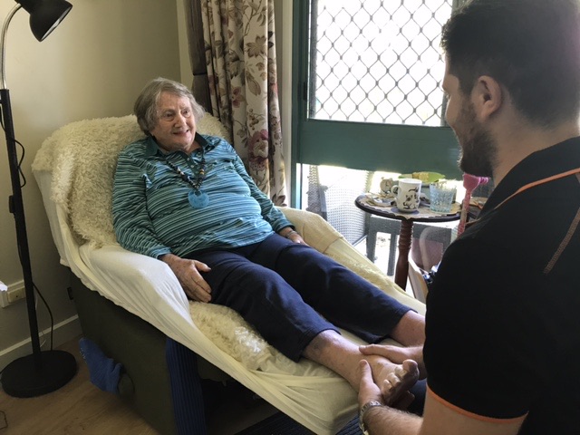 Clinician visiting a client at home