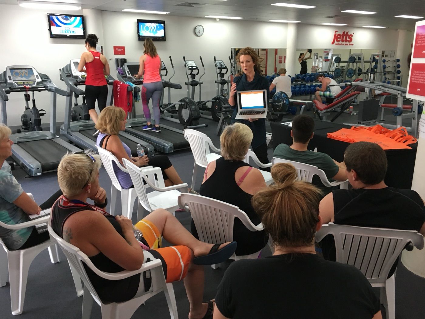 Optimum presenter delivering a workplace health talk to staff onsite